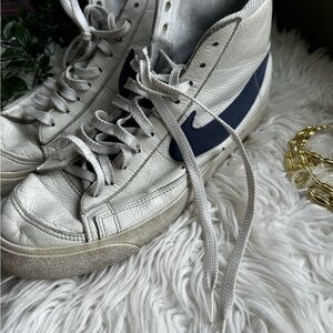 Vintage Nike Blue and White Sneakers with Orange Logo